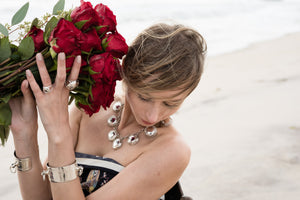 Champers Opera Necklace worn on model with Bucket Cuff and Champers Rings